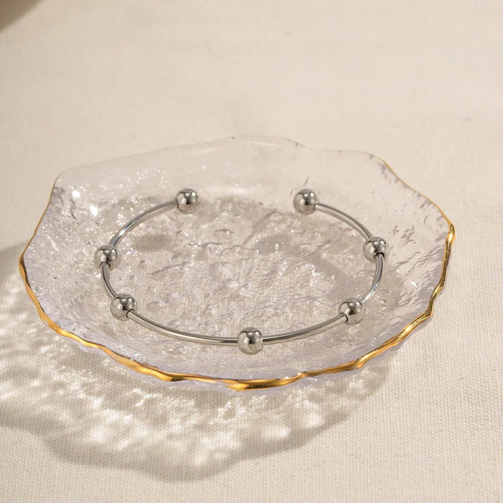 Bracelet jonc élégant à sphères