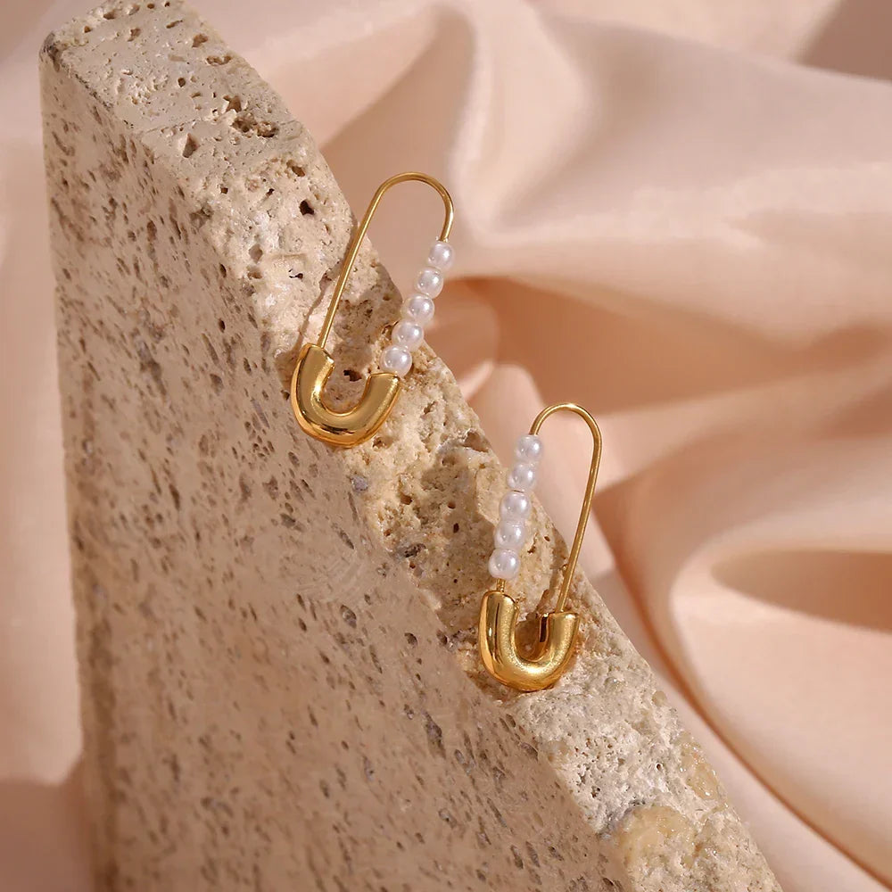 Boucles d'oreilles épingle à nourrice perle 18k
