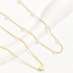 Collier ras-du-cou perles et cœur pour femme
