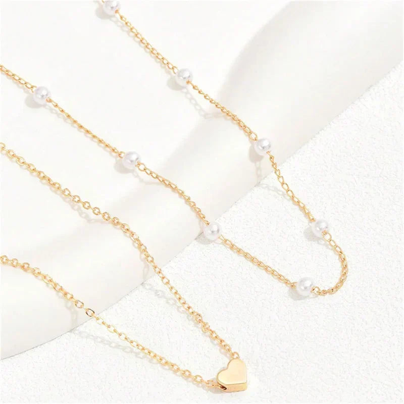 Collier ras-du-cou perles et cœur pour femme