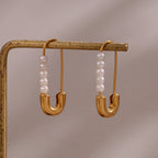 Boucles d'oreilles épingle à nourrice perle 18k