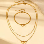 Parure collier et bracelet cœurs entrelacés