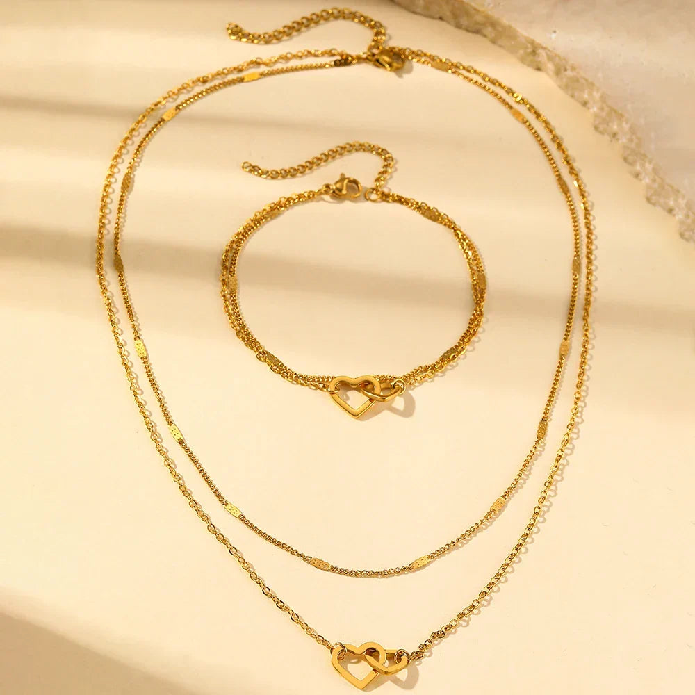 Parure collier et bracelet cœurs entrelacés