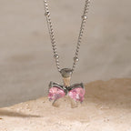 Collier nœud féminin délicat avec diamants