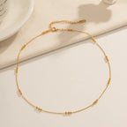 Collier délicat à trois perles 16 carats