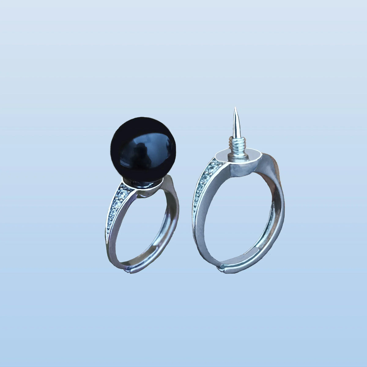 Bague avec perle noire et couteau dissimulé