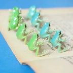 Ensemble bague et boucles d'oreilles grenouille