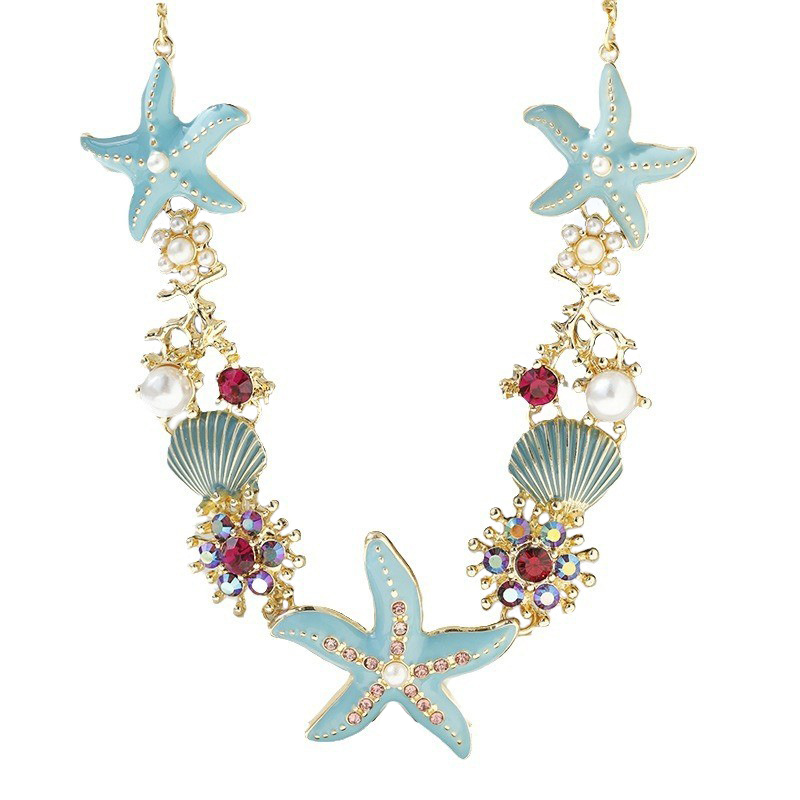 Collier perles, coquillage et étoile de mer