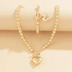 Parure 2 pièces collier et bracelet perles cœur