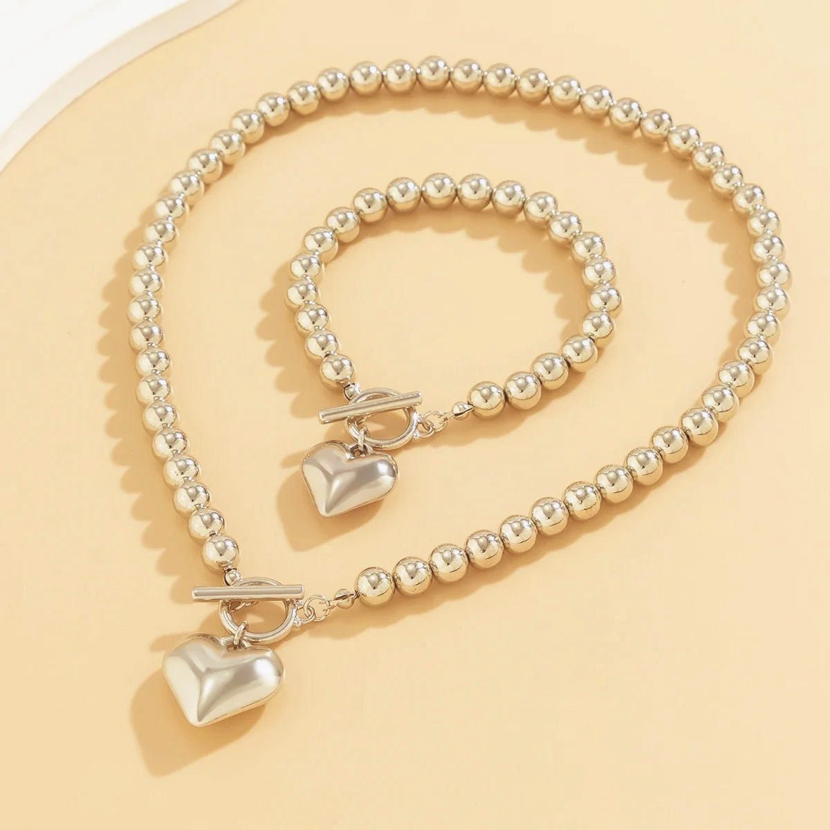 Parure 2 pièces collier et bracelet perles cœur
