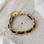 Bracelet en cuir tressé, chaîne dorée et noire