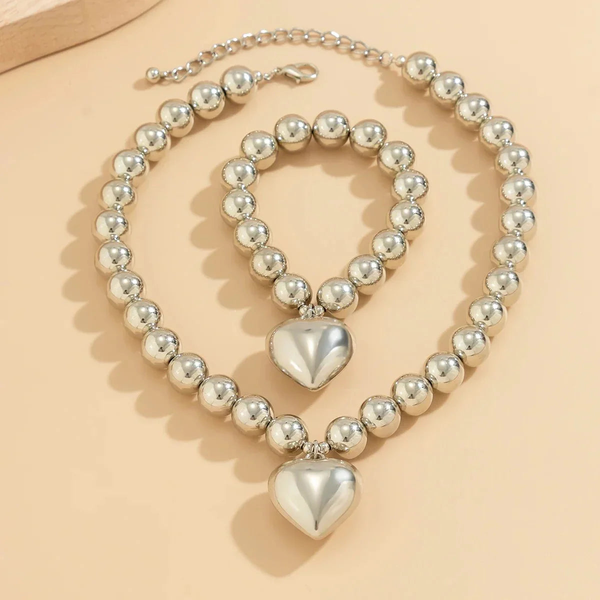 Ensemble collier et bracelet avec pendentif cœur