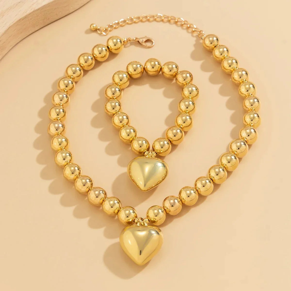 Ensemble collier et bracelet avec pendentif cœur