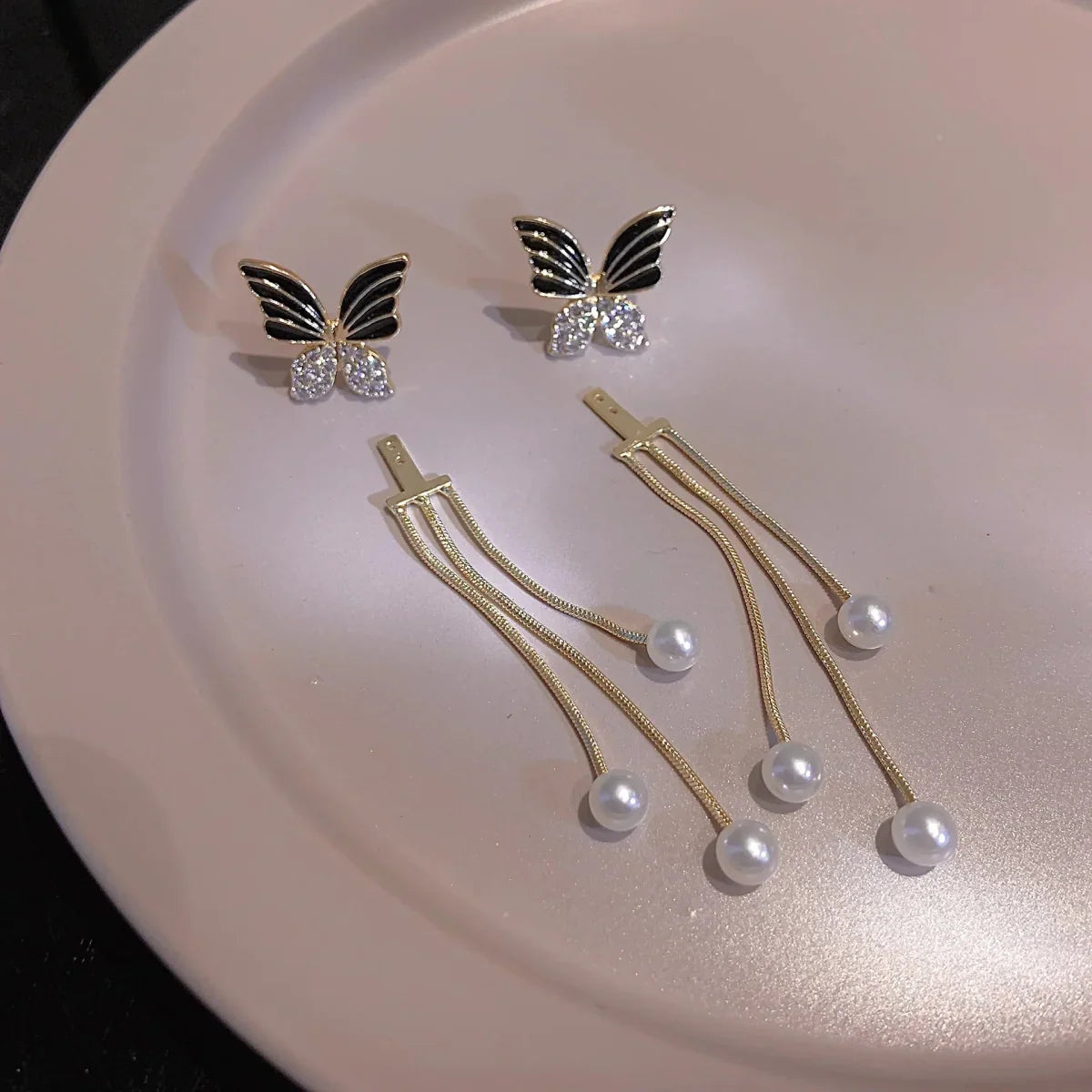 Boucles d'oreilles pendantes papillon