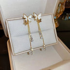 Boucles d'oreilles pendantes papillon