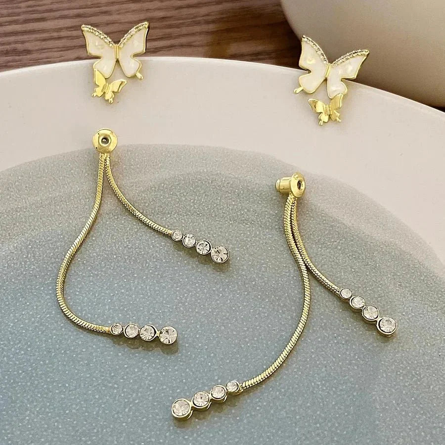 Boucles d'oreilles pendantes papillon
