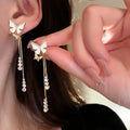 Boucles d'oreilles pendantes papillon