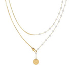 Collier superposé à chevrons et perles