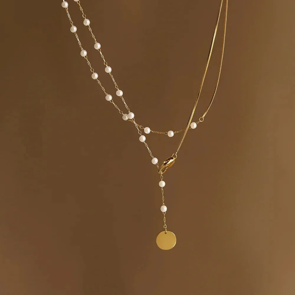 Collier superposé à chevrons et perles