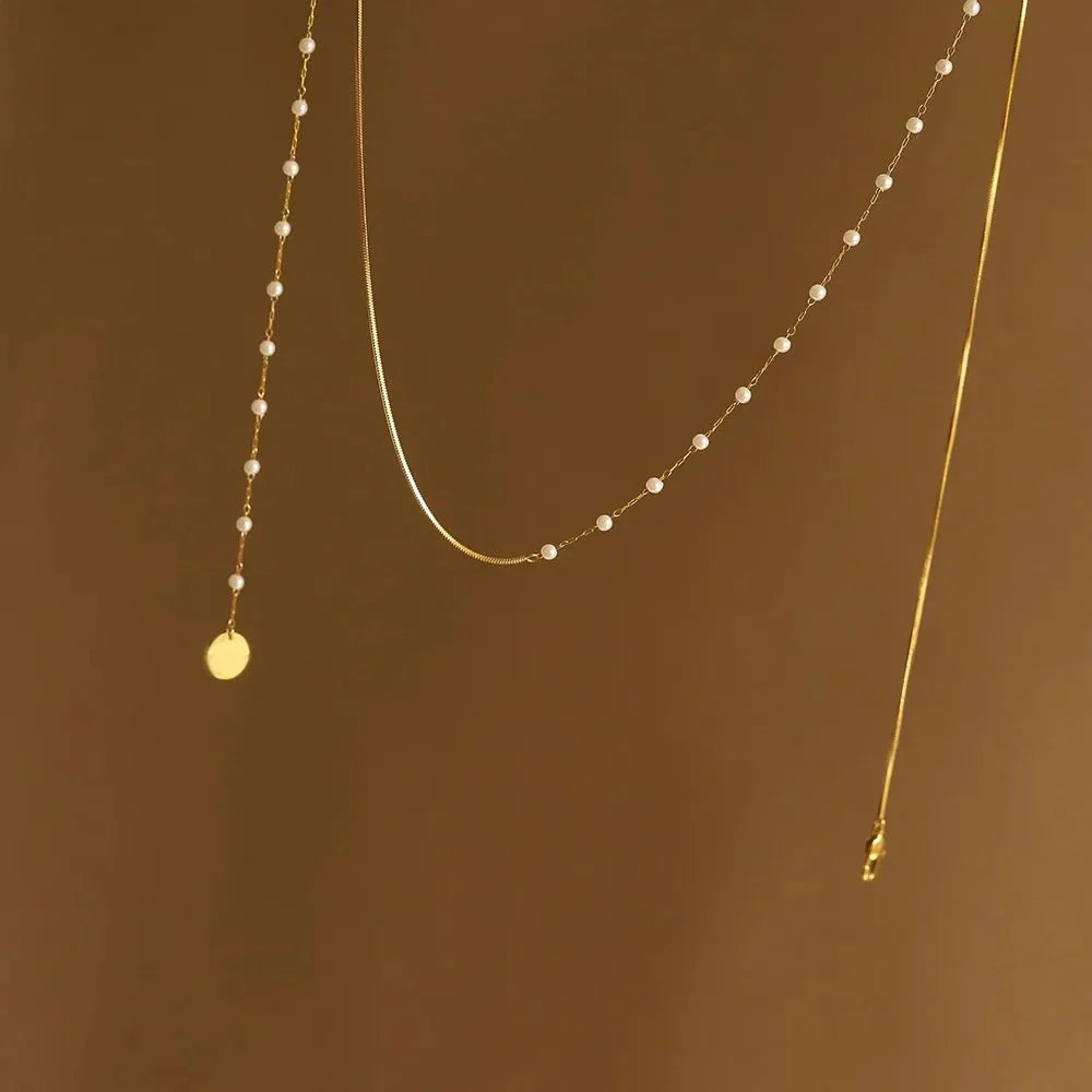 Collier superposé à chevrons et perles