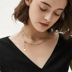 Collier superposé à chevrons et perles