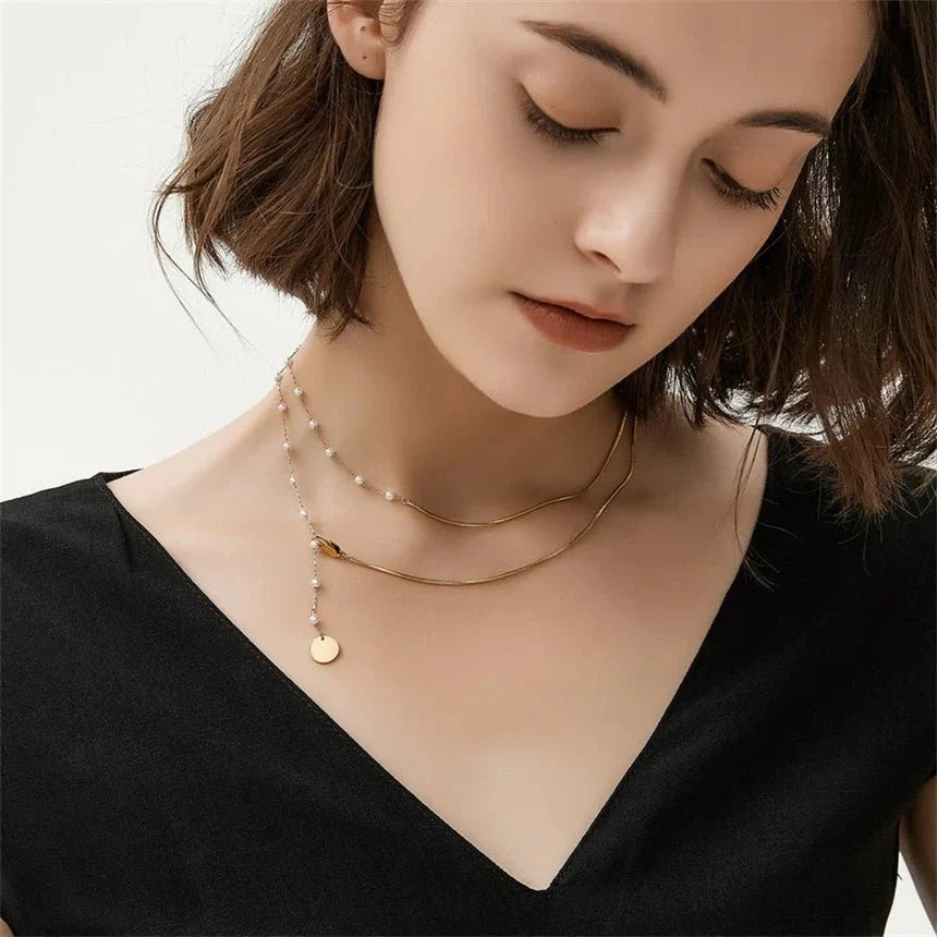 Collier superposé à chevrons et perles
