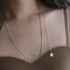 Collier superposé à chevrons et perles