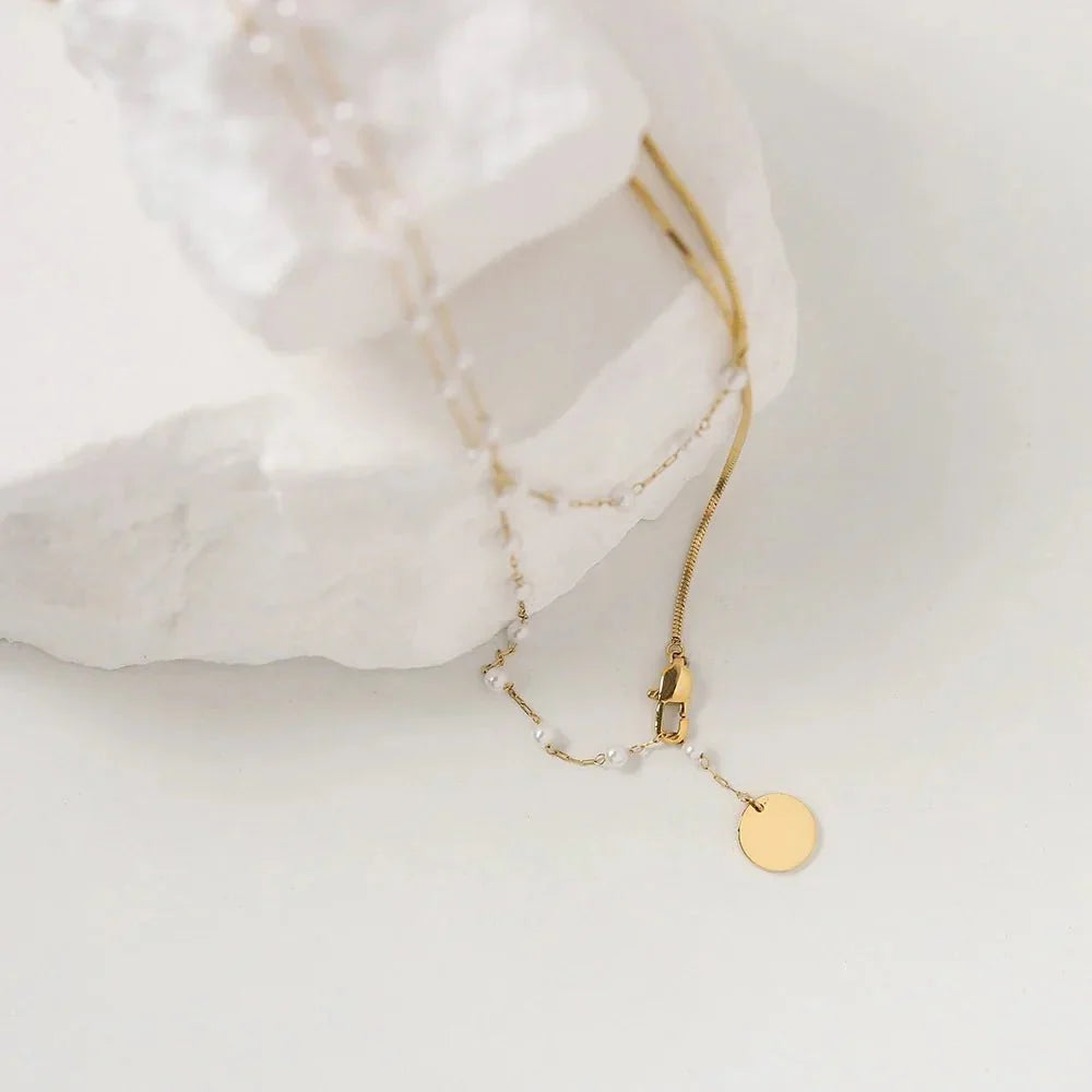 Collier superposé à chevrons et perles
