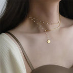 Collier superposé à chevrons et perles