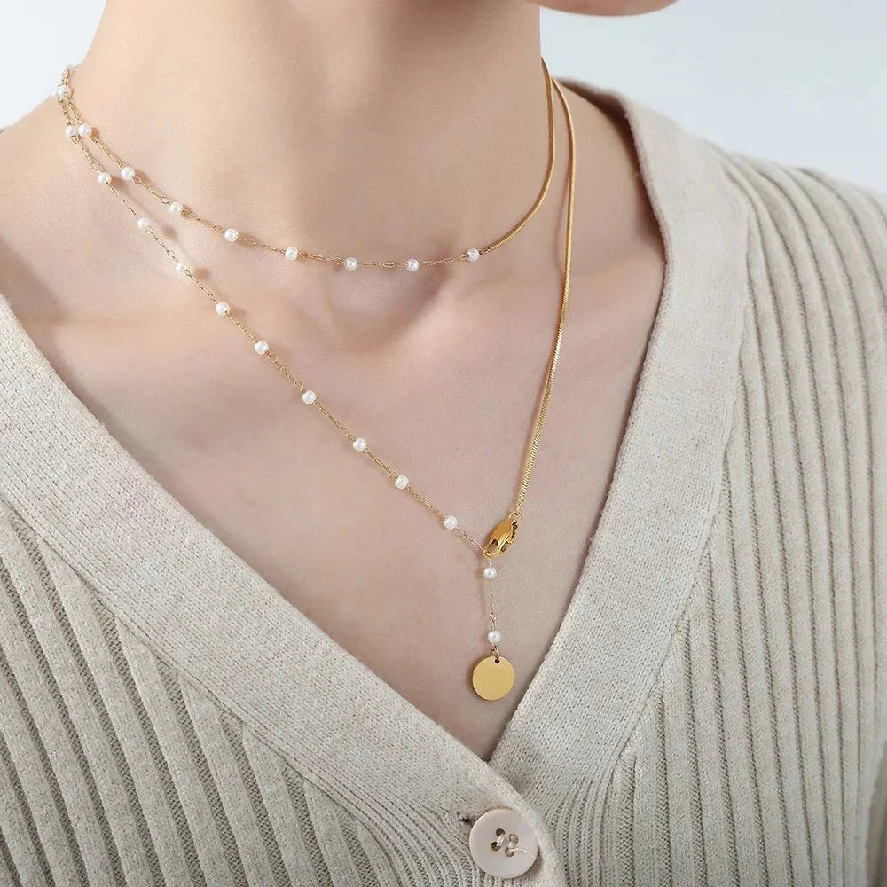 Collier superposé à chevrons et perles