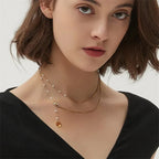 Collier superposé à chevrons et perles