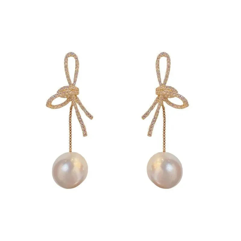 Boucles d'oreilles pendantes nœud et perle