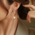 Boucles d'oreilles pendantes nœud et perle