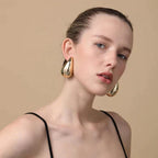 Boucles d'oreilles pendantes élégantes en forme de goutte