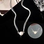 Collier avec pendentif cœur magnétique