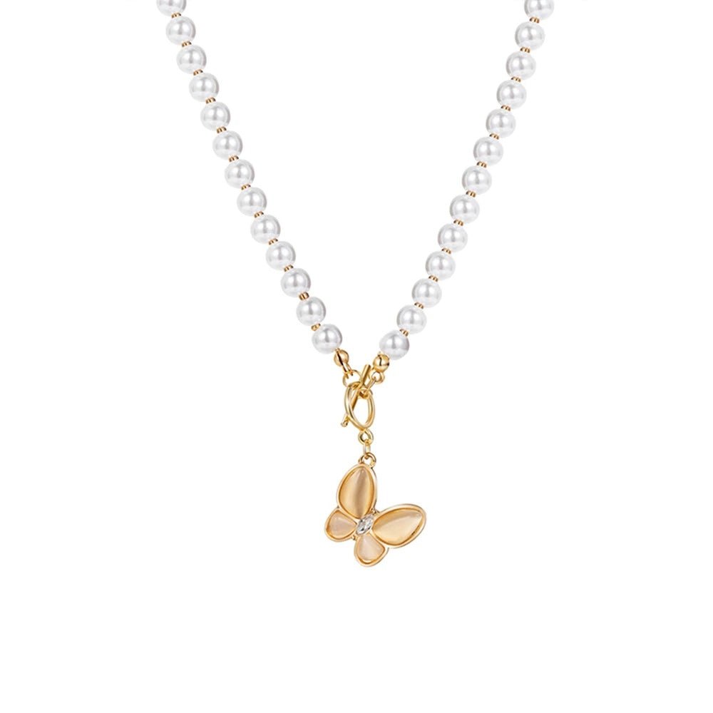 Collier ras-de-cou avec fermoir papillon en cristal doré
