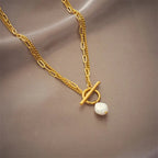 Collier superposé avec fermoir cercle et perle