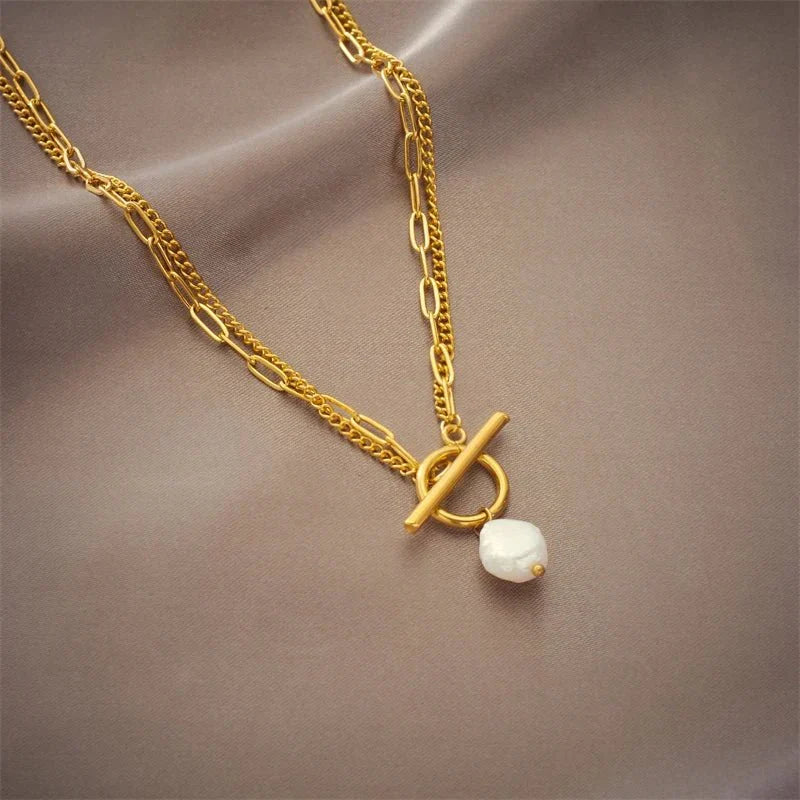 Collier superposé avec fermoir cercle et perle