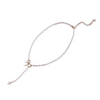 Collier lariat avec perles et nœud délicat