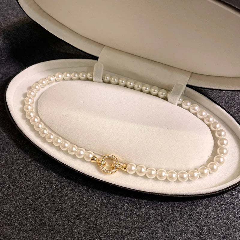 Parure bracelet et collier pendentif cercle perle et diamant