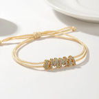 Bracelet à corde superposée avec nom personnalisé et diamants