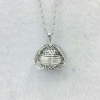 Collier médaillon ailes d'ange
