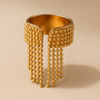 Bague ajustable à pompons en or 18 carats