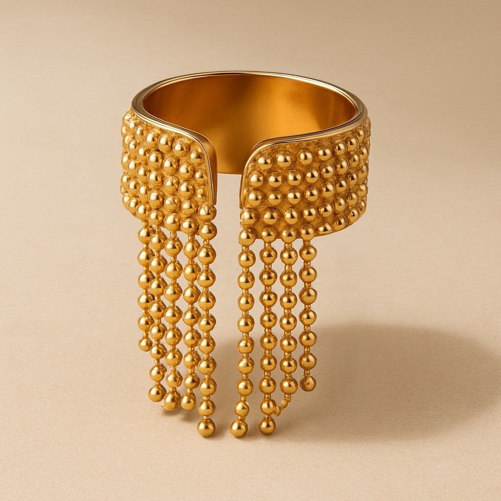 Bague ajustable à pompons en or 18 carats